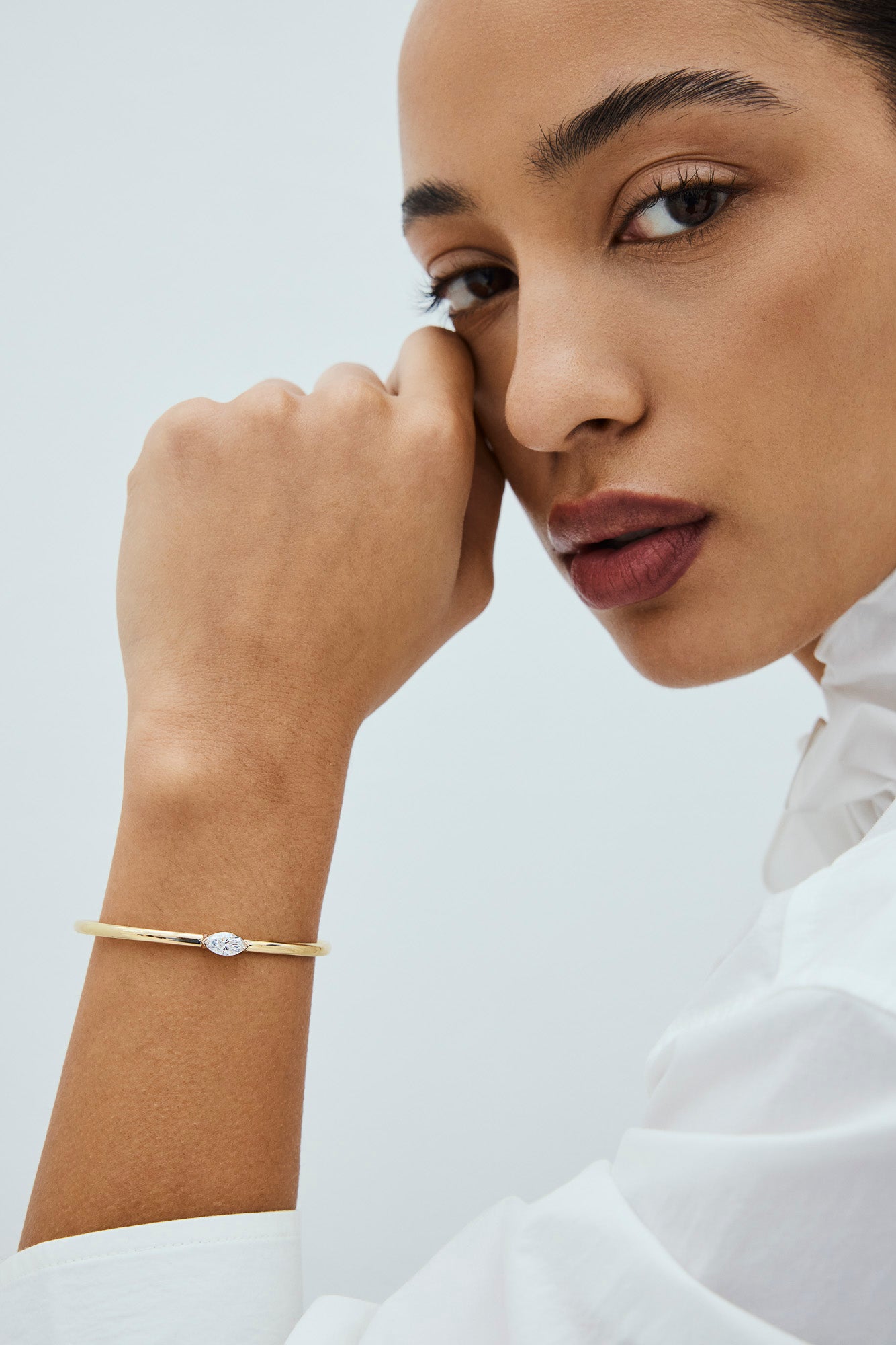 Close-up of a woman wearing a lab-grown diamond bracelet